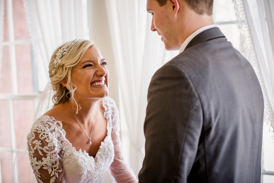 Historic Westwood in Knoxville, TN bride cracking up during first look.