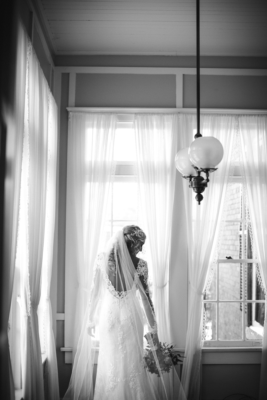 Historic Westwood in Knoxville, TN black and white in window room of bride.