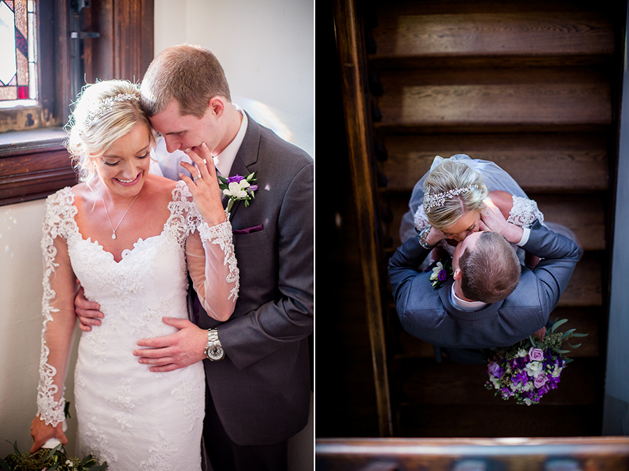 Historic Westwood in Knoxville, TN bride and groom standing on steps kissing.