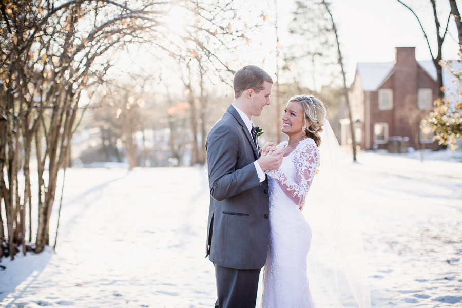 Historic Westwood in Knoxville, TN bride and groom dancing in snow.