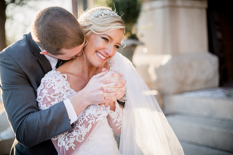 Historic Westwood in Knoxville, TN groom kissing bride's neck.