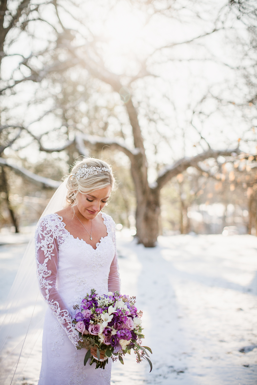 Historic Westwood in Knoxville, TN bride looking down at her flowers.