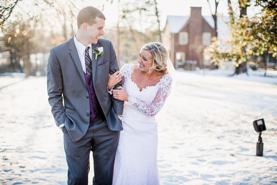 Historic Westwood in Knoxville, TN bride and groom bumping hips.