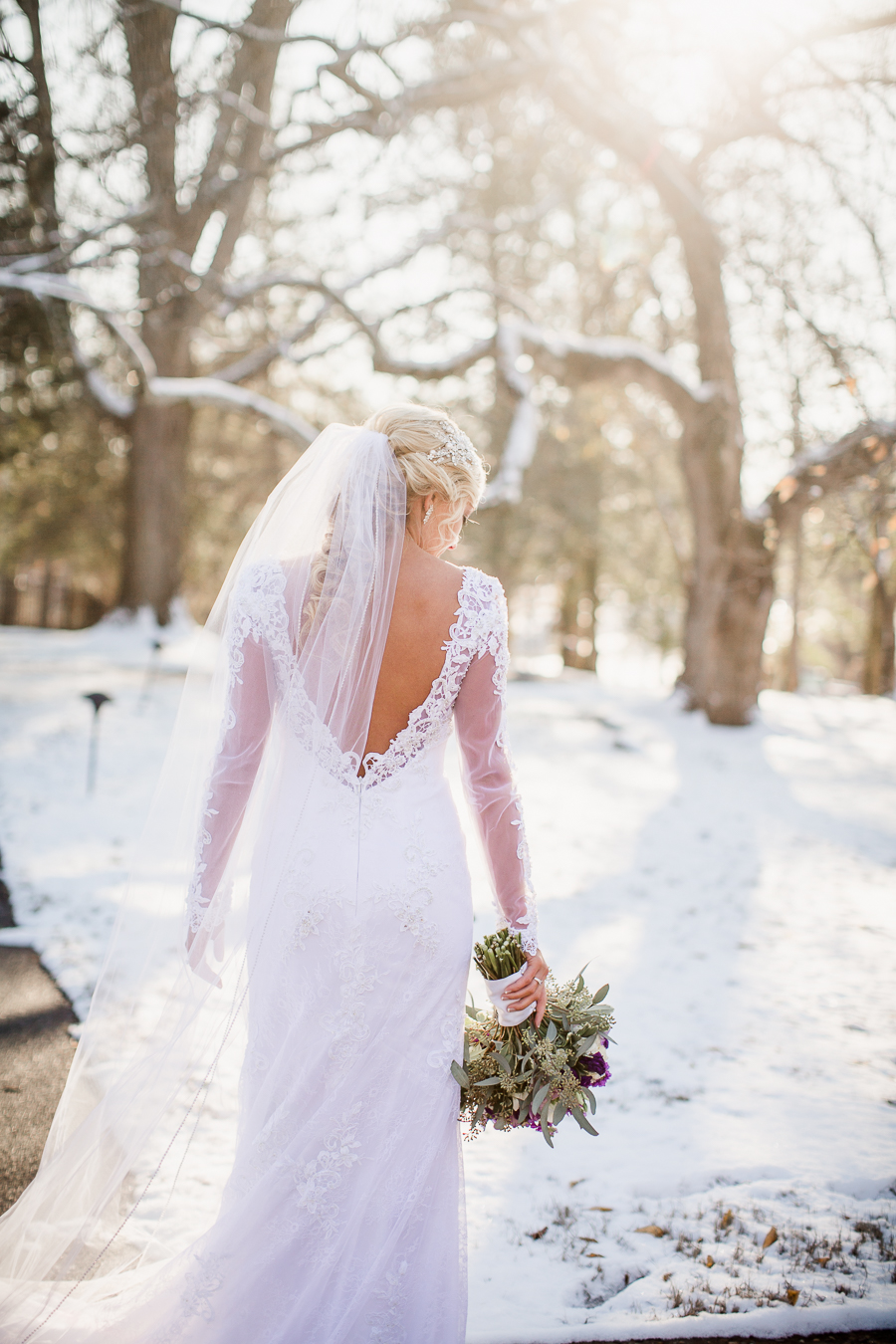 Historic Westwood in Knoxville, TN back of bride looking down at bouquet.