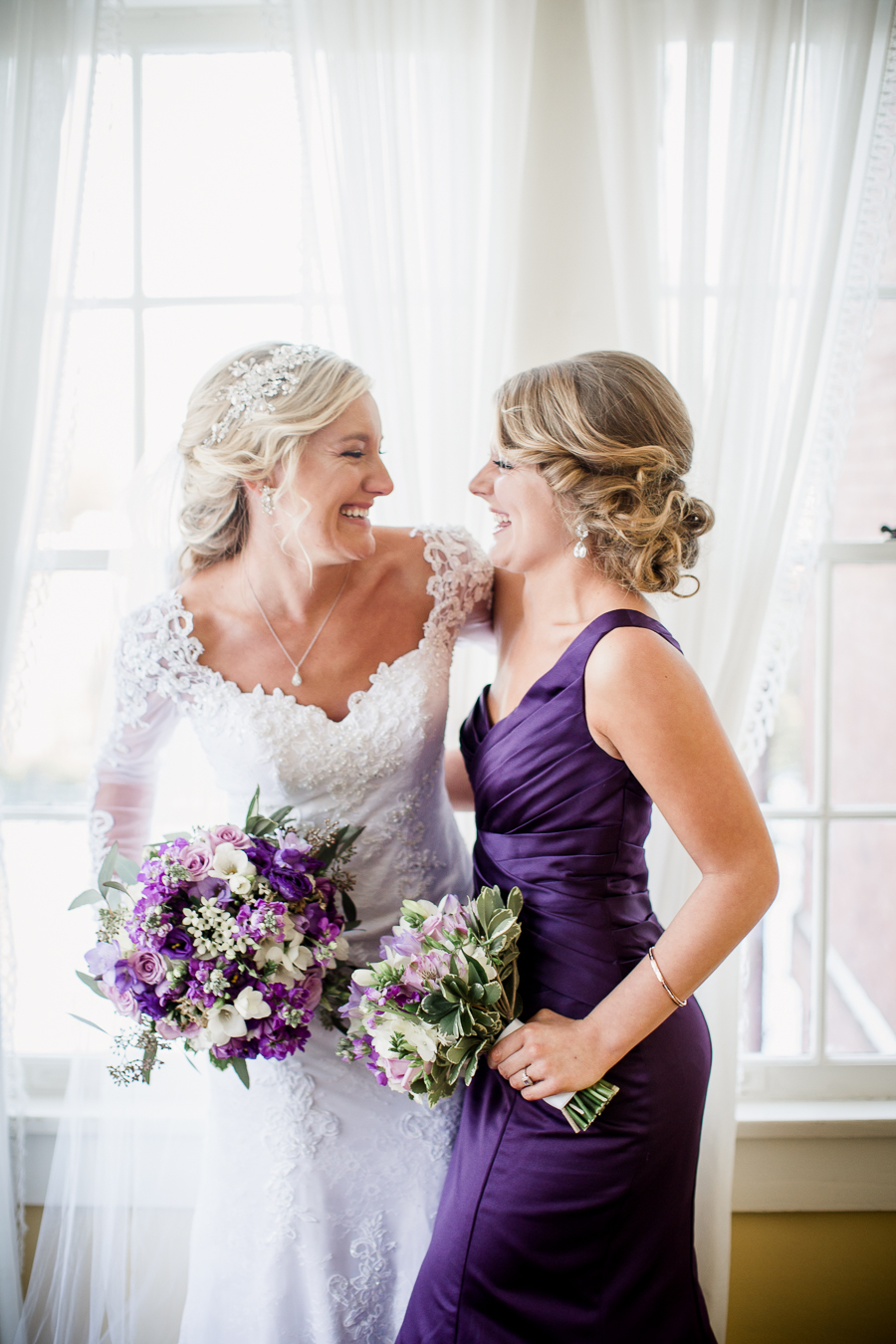 Historic Westwood in Knoxville, TN bride and her sister laughing photo.