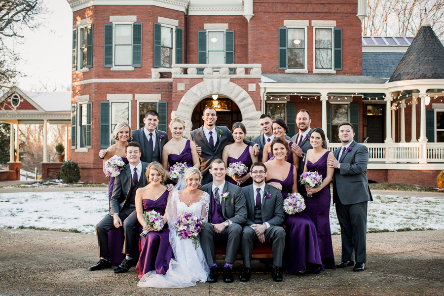 Historic Westwood in Knoxville, TN entire bridal party sitting on vintage couch photo.