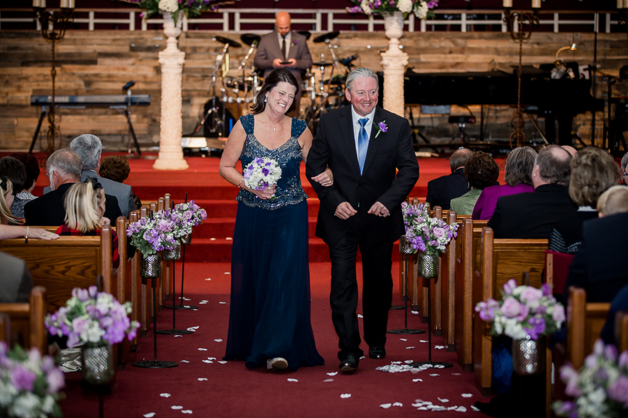 Historic Westwood in Knoxville, TN groom's parents exiting ceremony photo.