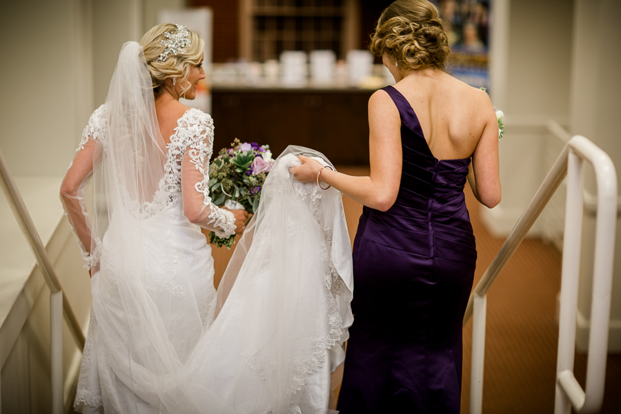 Historic Westwood in Knoxville, TN maid of honor carrying bride's train photo.