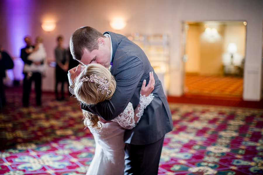 Historic Westwood in Knoxville, TN groom dips his bride during reception photo.