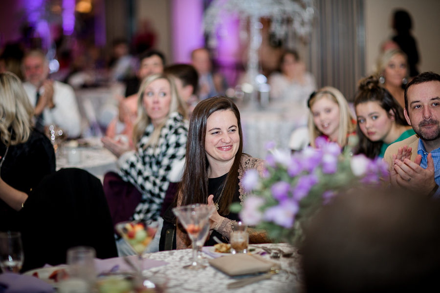 Historic Westwood in Knoxville, TN guest laughing during toast photo.