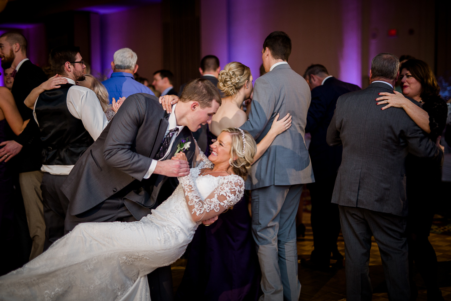 Historic Westwood in Knoxville, TN groom dipping his bride on the dance floor photo.