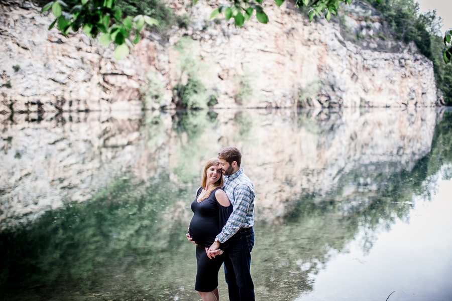 Hugging her from behind at this Meads Quarry Maternity session by Knoxville Wedding Photographer, Amanda May Photos.