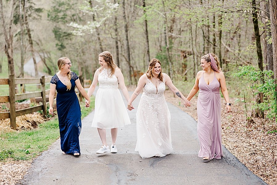 brides and bridesmaids at backyard wedding