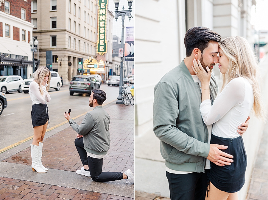 Boy proposes to girl in front of the tennessee sign at this downtown Knoxville proposal by Amanda May Photos.