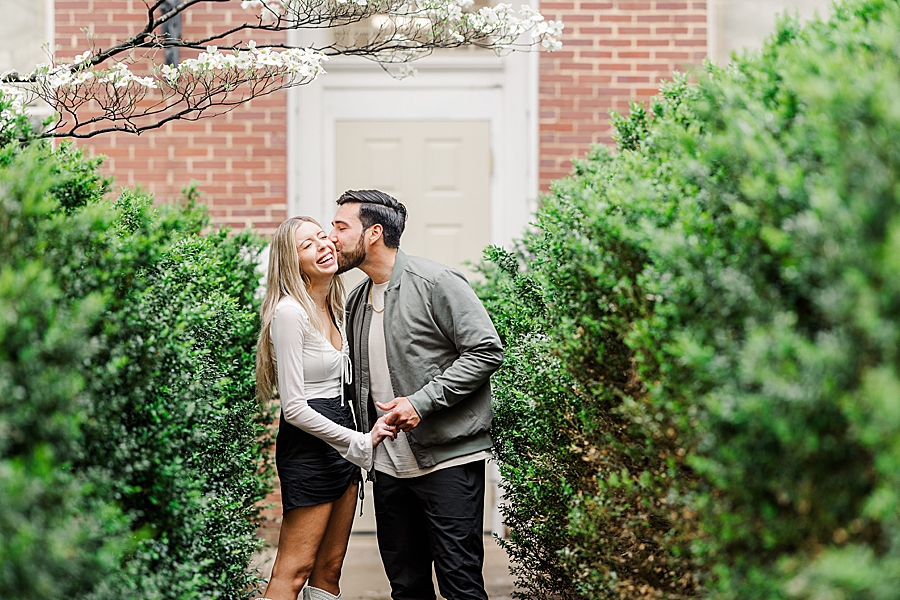 Kissing her cheek at this downtown Knoxville proposal by Amanda May Photos.