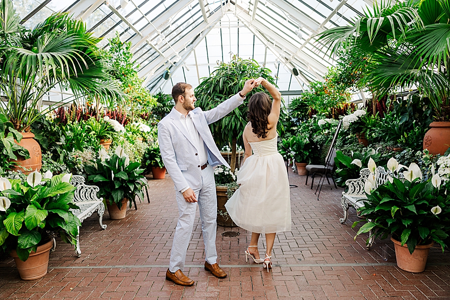 twirling in conservatory at biltmore engagement