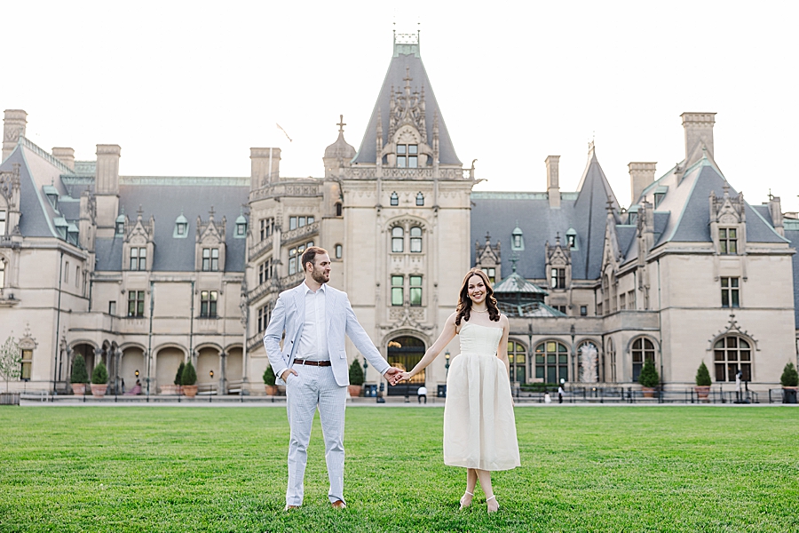 holding hands in front of biltmore