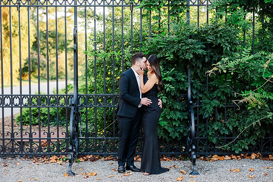 couple in front of greenery