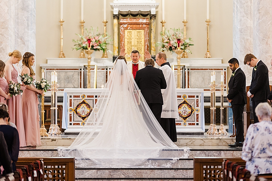 Couple standing at the altar at Julianna Wedding by Amanda May Photos