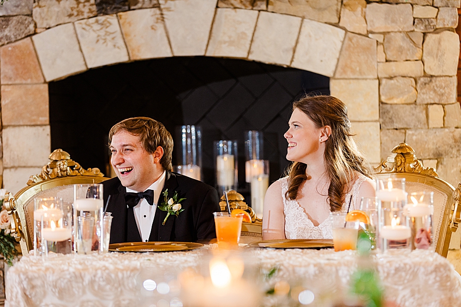 Groom laughing at wedding by Amanda May Photos