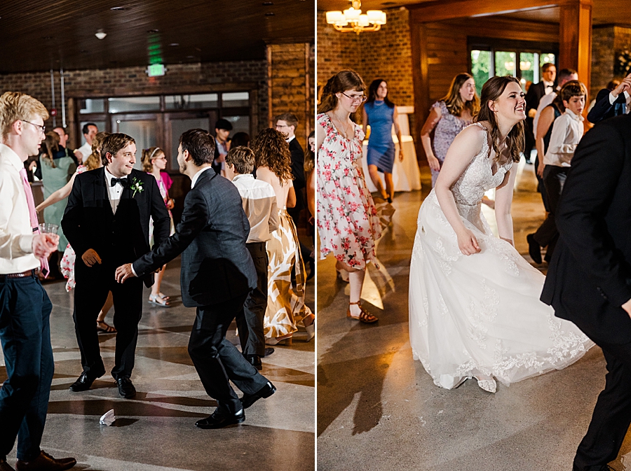 Groom dancing with friends at wedding by Amanda May Photos