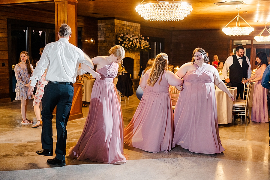 Wedding party dancing at wedding by Amanda May Photos