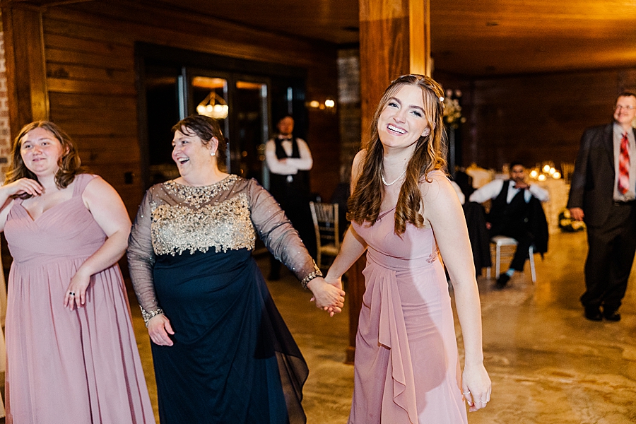 Family dancing at wedding by Amanda May Photos