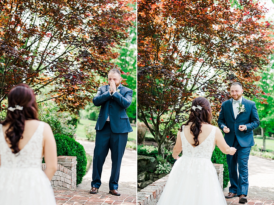 Bride and groom first look at Carriage House Wedding by Amanda May Photos