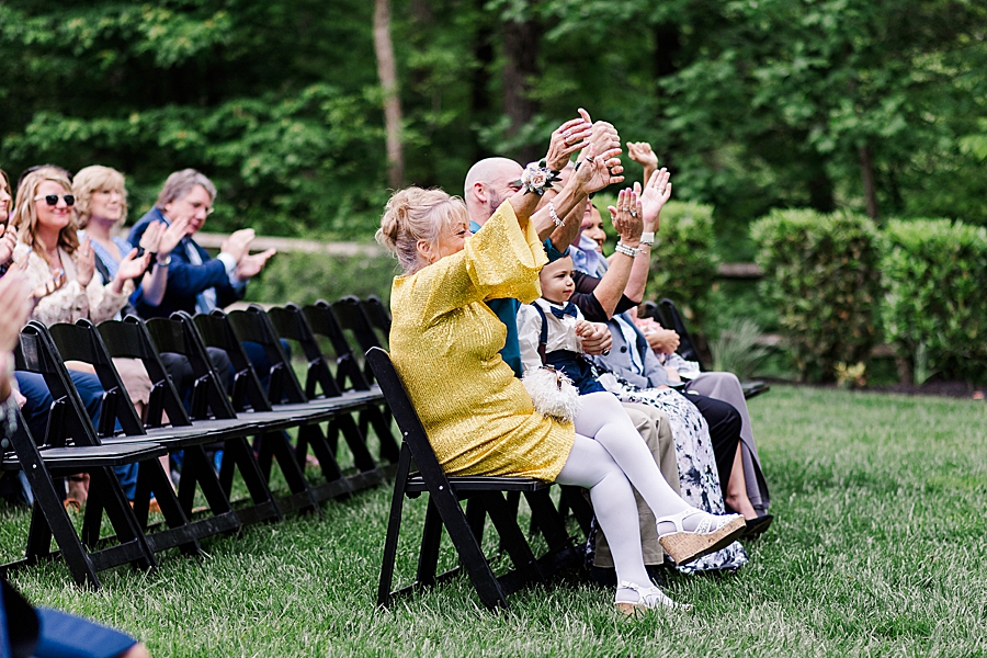 Family cheers at Wedding by Amanda May Photos