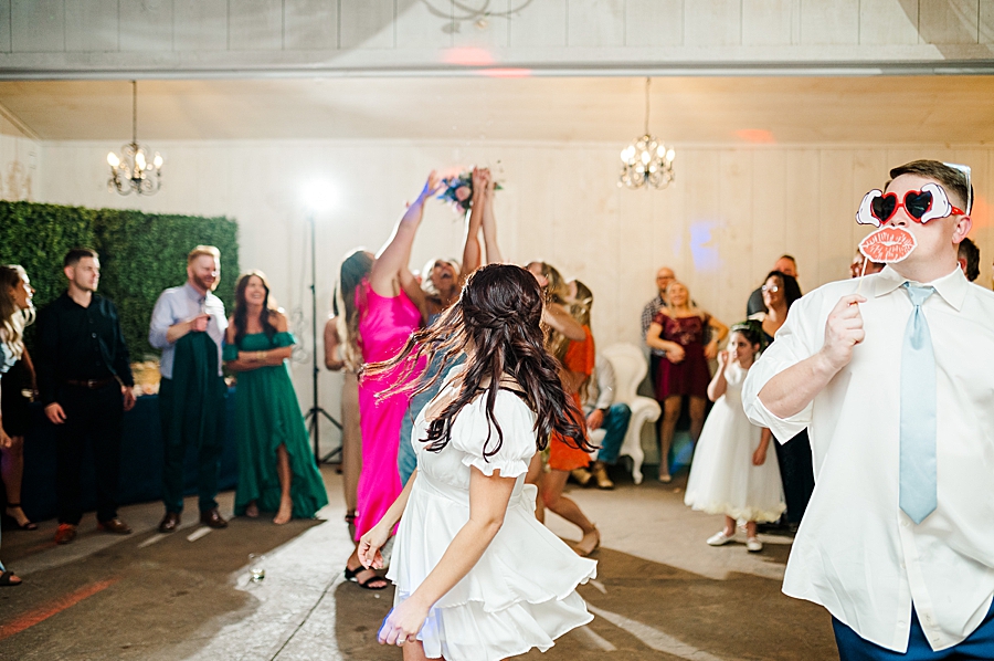 Bride dancing at Wedding by Amanda May Photos