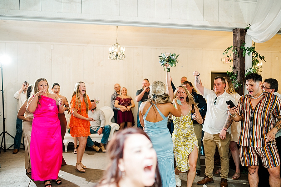 Guest celebrates at Wedding by Amanda May Photos