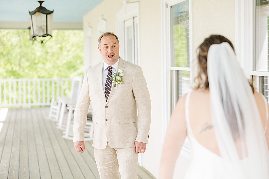 Dad's first reaction to bride at Castleton Farms Wedding with a Rainbow by Amanda May Photos