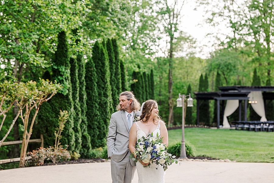 Looking away at Castleton Farms Wedding by Amanda May Photos