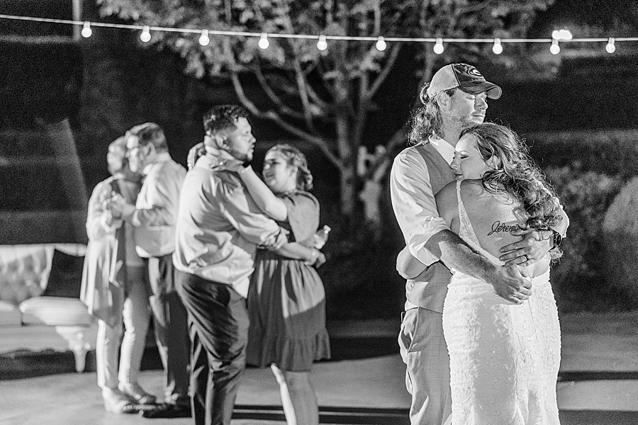 Bride and groom slow dance at Castleton Farms Wedding by Amanda May Photos