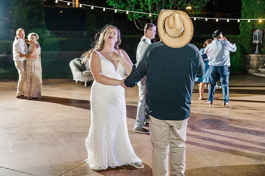 Bride and guest dance at Castleton Farms Wedding by Amanda May Photos