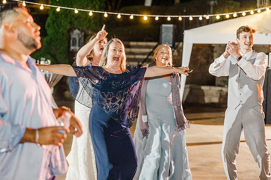 Mom dancing at Castleton Farms Wedding by Amanda May Photos