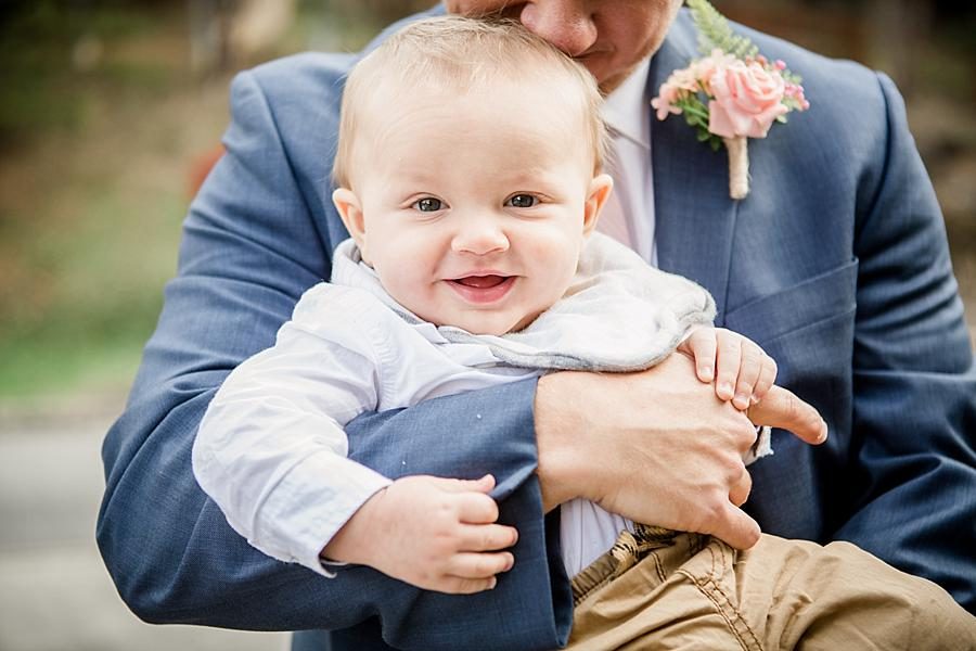 Baby smiling at this Alpine Village Wedding Chapel by Knoxville Wedding Photographer, Amanda May Photos.