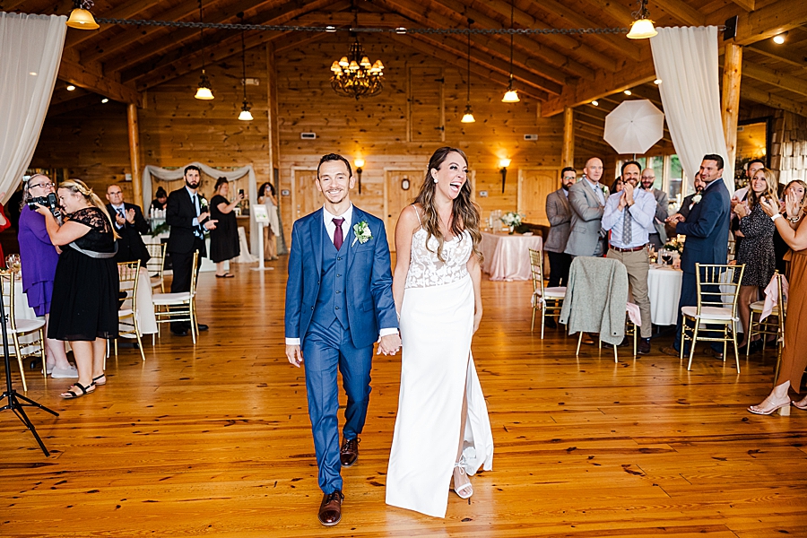 couple entering brother's cove reception
