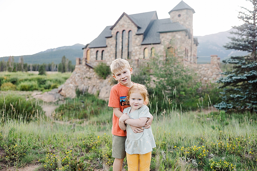 Brother and sister hugging at Camp St. Malo in Colorado by Knoxville Wedding Photographer, Amanda May Photos.
