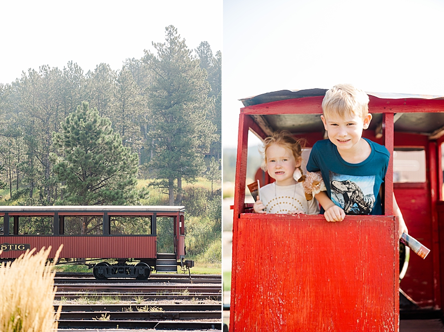 Sticking head out of play train at 1880 train in rapid city, South Dakota by Knoxville Wedding Photographer, Amanda May Photos.