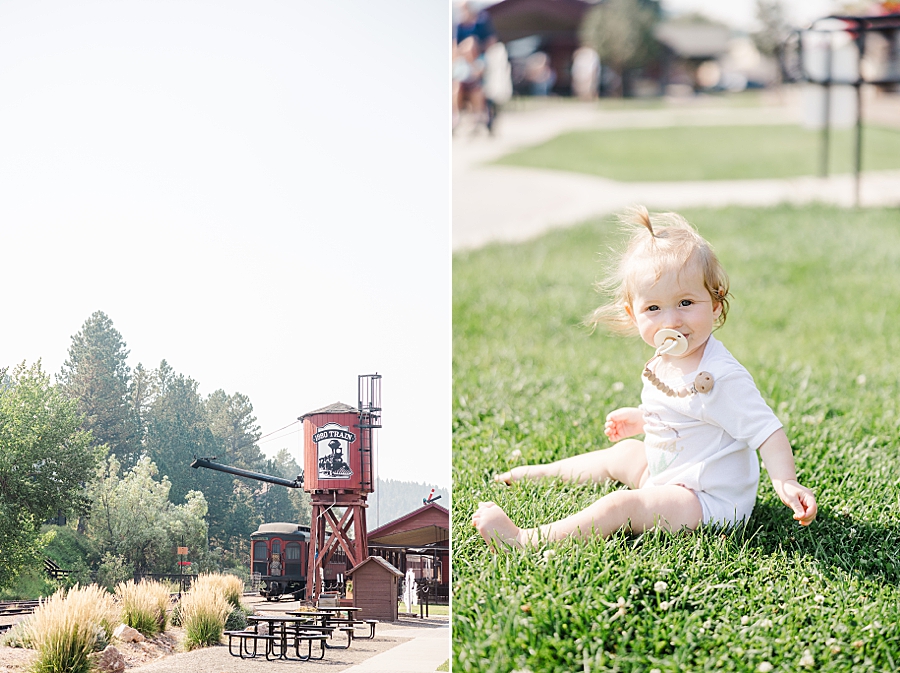 9 month old sitting in grass at 1880 train in rapid city, South Dakota by Knoxville Wedding Photographer, Amanda May Photos.