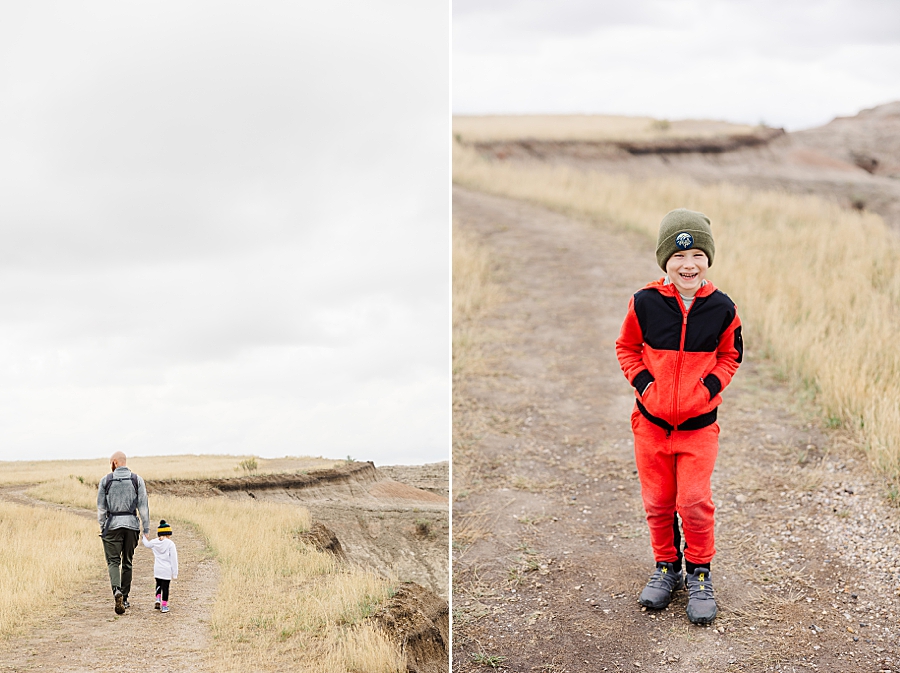 Little boy laughing at Badlands National Park in South Dakota by Knoxville Wedding Photographer, Amanda May Photos.