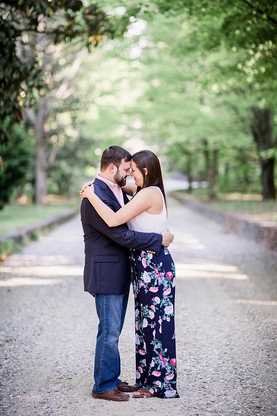 Standing in the drive at this Knoxville Botanical Engagement session by Knoxville Wedding Photographer, Amanda May Photos.