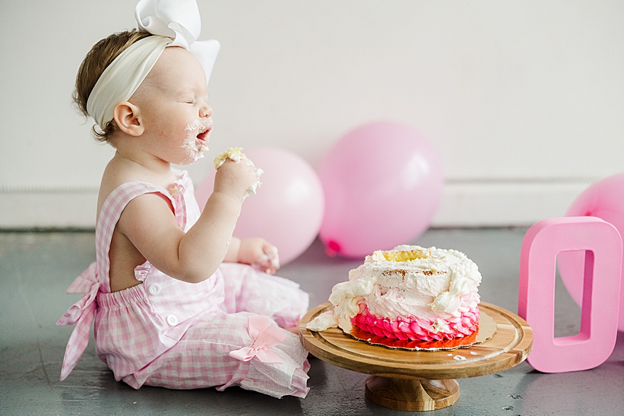 happy baby during cake smash