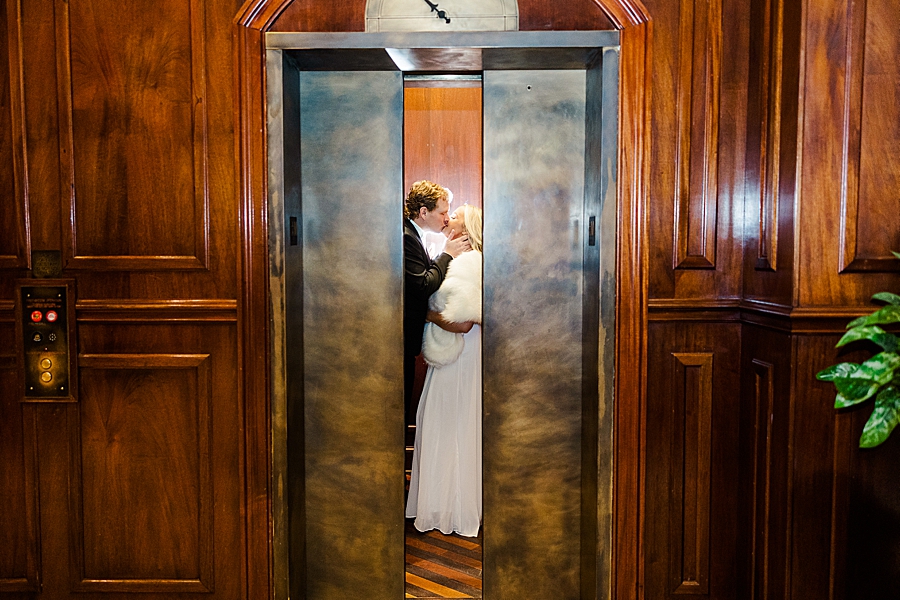 kissing on the elevator at carnegie hotel engagement