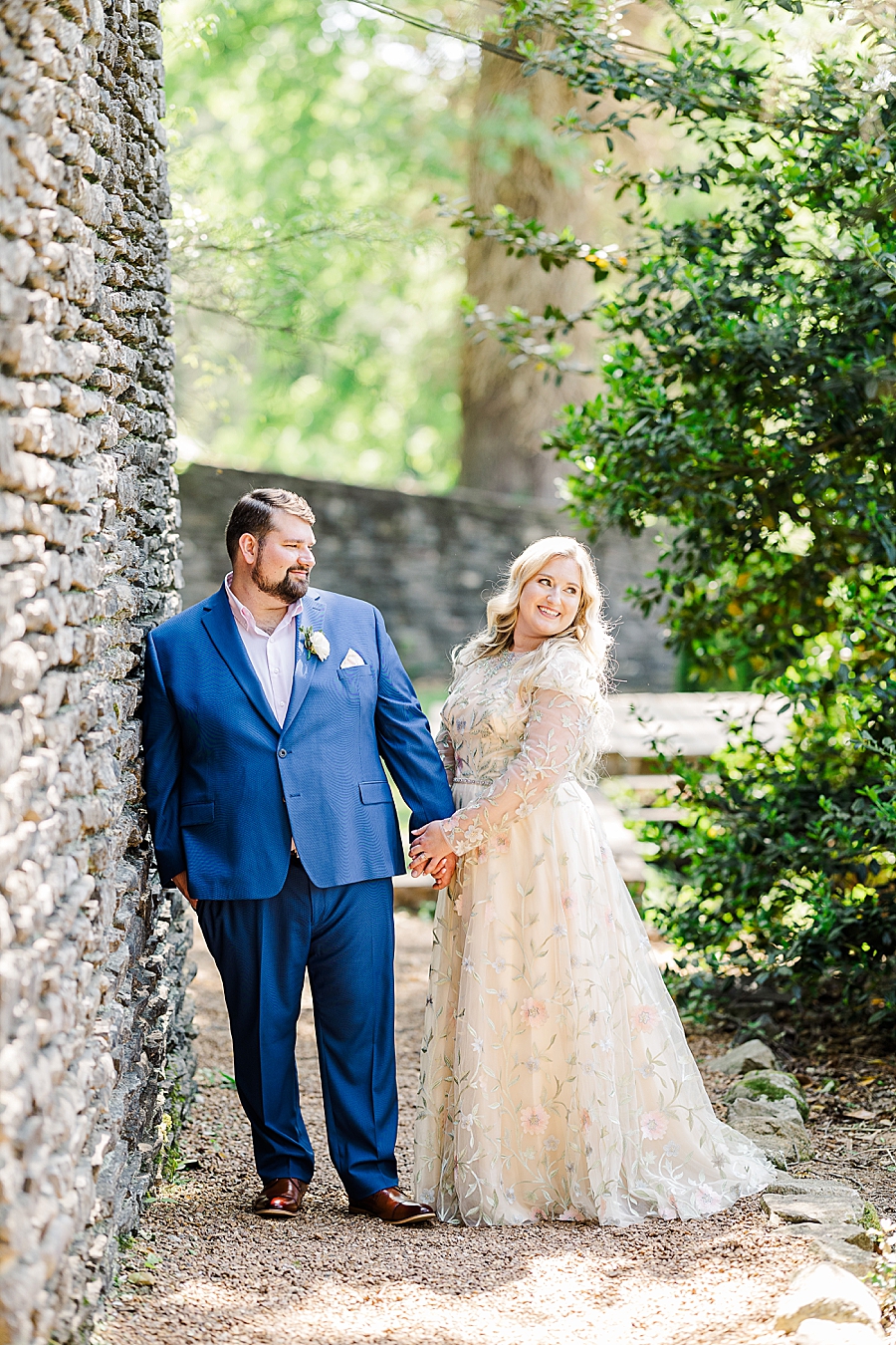 Holding hands at Knoxville Botanical Gardens Wedding by Amanda May Photos