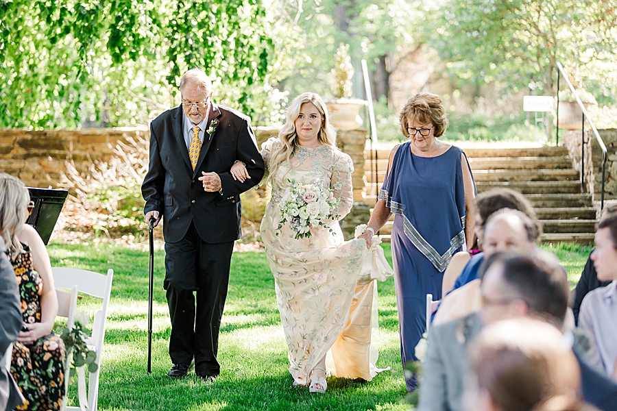 Bride walking down the aisle at Knoxville Botanical Gardens Wedding by Amanda May Photos