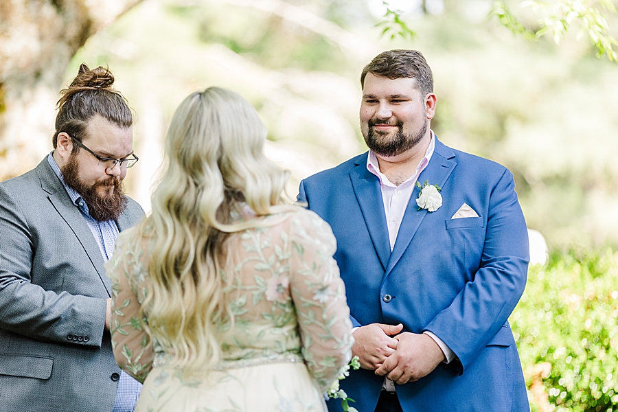 Groom smiling at bride at Knoxville Botanical Gardens Wedding by Amanda May Photos