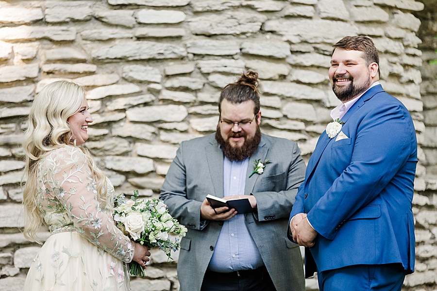 Groom slimes at guests at Knoxville Botanical Gardens Wedding by Amanda May Photos