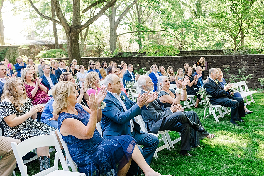 Guests clap at Knoxville Botanical Gardens Wedding by Amanda May Photos
